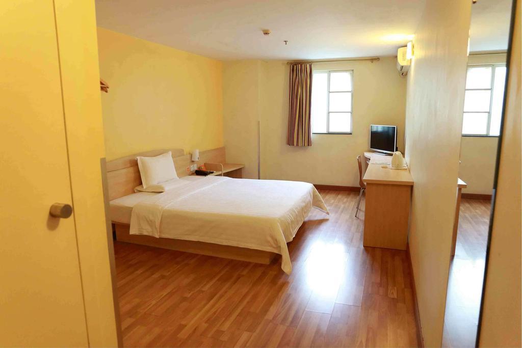 7Days Inn Luoyang Zhongzhou Road Hall Of Enlightened Rule Номер фото