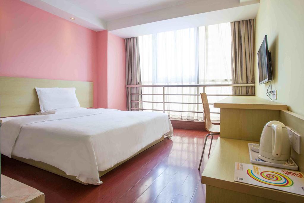 7Days Inn Luoyang Zhongzhou Road Hall Of Enlightened Rule Номер фото